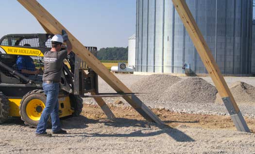 Construction worker installing Perma-Column®