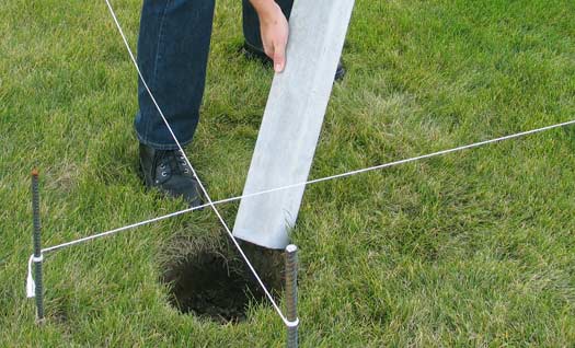 Placing deck post in hole