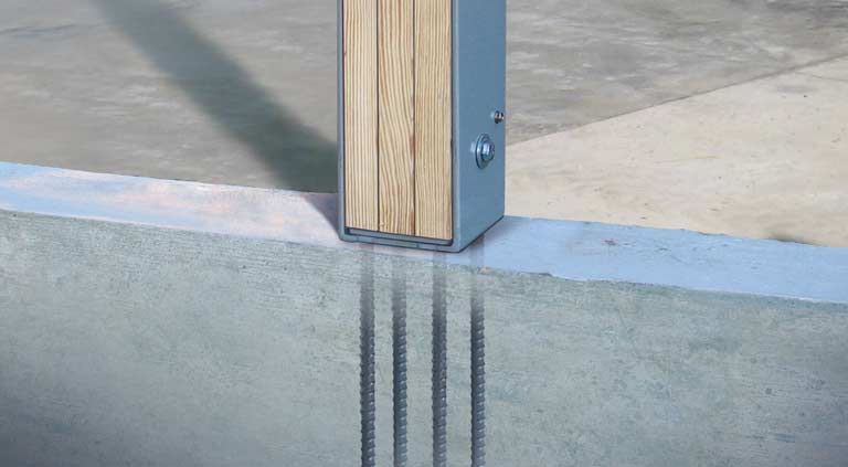 Post-frame with Strurdi-Wall® Plus anchored into concrete foundation with welded rebar
