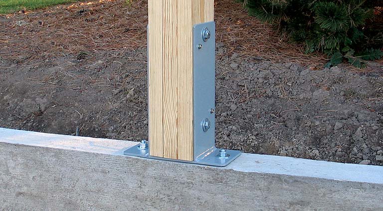 Post-frame with Sturdi-Wall® bracket mounted on concrete foundation